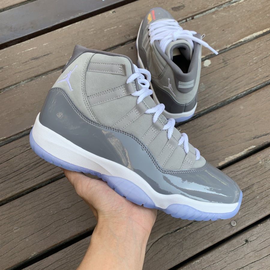 Grey jordan 11 retro best sale