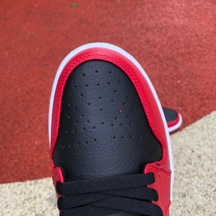 Jordan 1 Low Reverse Bred Pebbled Swoosh