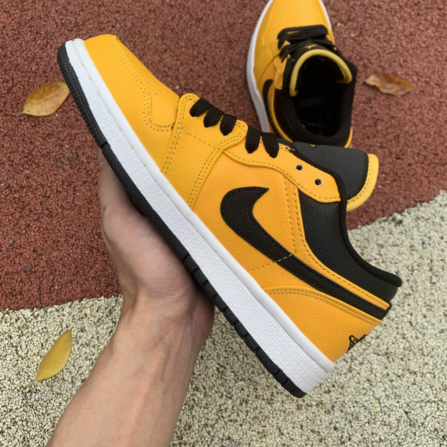 Jordan 1 Low University Gold