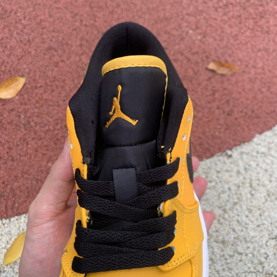 Jordan 1 Low University Gold